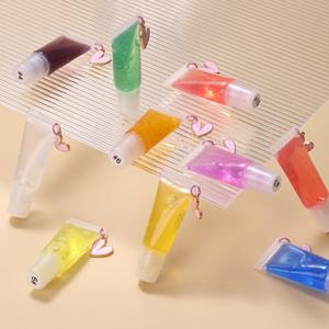 Etiqueta privada Vegan Fruity Plumping Lip Oil Mineral-Incuded Hidratante Líquido Pink Lip Gloss Oil - Product Image 1