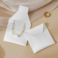 Sac à bijoux en flanelle blanche personnalisé, directement de l'usine, enveloppe anti-poussière avec cordon de serrage, emballage cadeau moderne pour bague
