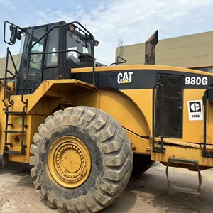 Cargadora de Ruedas Caterpillar 980G Modelo 2020, Capacidad de Carga Nominal de 45 Toneladas, Cabina Cerrada Amarilla, Neumáticos Todoterreno Grandes, Motor y Bomba - Product Image 6