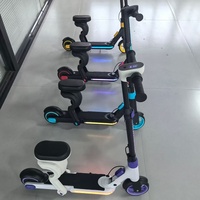 Trottinette électrique transfrontalière 6,5 pouces à deux roues avec cadre en alliage d'aluminium et roues en PU, modèle E74, nouvelle, 25 km/h, portable, pliable, avec siège pour enfants