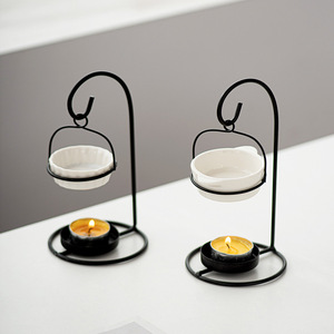 Venta al por mayor de cerámica blanca soporte de metal negro Cera colgante quemadores de fusión aromaterapia quemador de aceite esencial decoración del hogar - Product Image 1
