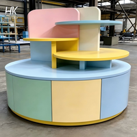 Comptoir d'exposition Hongkai personnalisable avec éclairage LED, écologique, base rose pastel, plateau lavande, et piédestal à niveaux vert menthe pour