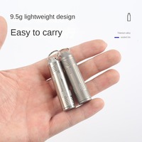 Mini étui à pilules portable en alliage de titane auto-scellant EDC briquet étanche pour les activités de plein air comme l'escalade usage décontracté