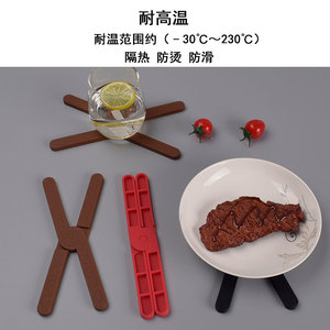 แผ่นรองจานซิลิโคนแบบพับได้รูปทรงกากบาททนความร้อนกันลื่นที่รองหม้อ - Product Image 5