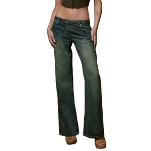 Nouveau jean en denim bleu pour femme, taille très basse, avec détails de sablage léger - Product Image 1