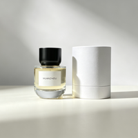 Vente en gros de flacons de parfum en verre transparent à pression haute de 50 ml avec bouchon noir mat, logo de marque personnalisé et boîte cadeau