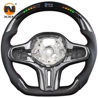 Volant de voiture en fibre de carbone LED en gros, compatible avec G05 X5 G06 X6 G07 X7, accessoires de modification de voiture de remplacement OEM