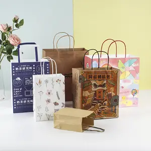 Hot sales Kraft Paper Bags with Handles Bulk Brown Paper Gift Bulk Medium Size Kraft Brown Retail Bags Craft shopping paper Bags