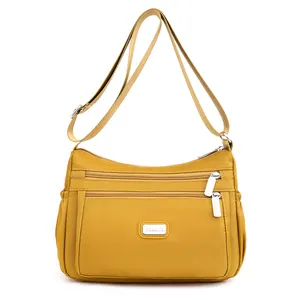 Bolso cruzado de moda para mujer, ligero, impermeable, de tela de nailon, bolso de compras para bolas de masa hervida, sencillo pero informal y versátil