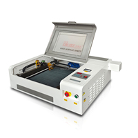 Petite machine portable de découpe et de gravure laser Co2 Machine de gravure de timbres Machine de gravure laser sur bois