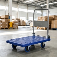 Chariot de manutention à quatre roues en plastique pour le transport et la manutention de marchandises industrielles