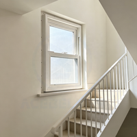 Fenêtres en vinyle blanc de style moderne américain Low E Glazed Double Hung Sash Sliding Open PVC Frame Vertical UPVC Double Hung Window