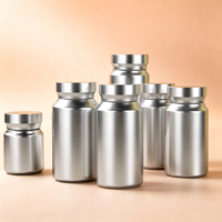 Bocaux cylindriques en PET argenté de 80 ml à 200 ml avec couvercles à vis pour la distribution de compléments alimentaires, d'huile de poisson, de capsules de vitamines et de comprimés.