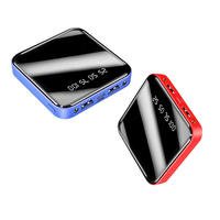 Batterie externe à charge rapide au design miroir fin 10000mAh avec affichage numérique LED, ports Micro USB et double USB