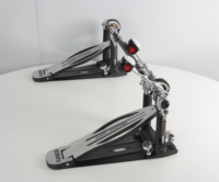 Pédale de tambour en fonte de basse à double pas de qualité sonore pure caractéristique de prévention de la rouille populaire pour accessoire de batterie