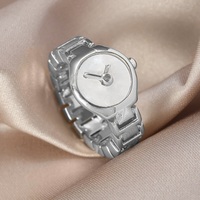 Bague en forme de montre plaquée or et argent, style minimaliste, tendance et affirmée pour femme
