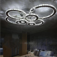 Lustres de plafond multi-têtes circulaires de luxe modernes en cristal et acier inoxydable avec télécommande pour salon et chambre à coucher