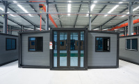 Maison conteneur extensible grise de 20 pieds, moderne, certifiée CE, étanche – Solution de construction préfabriquée industrielle en vrac pour grands projets