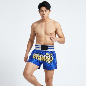 Pantalones Cortos de Boxeo Azules con Estampado de Letras Tailandesas por Transferencia Térmica, Logotipo Delantero y Trasero, Corte Regular, Unisex, Adulto, Secado Rápido, 100% para Deportes de Combate - Product Image 1