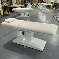 Table de soin électrique haut de gamme en cuir PU pliable et portable pour hôtels et salons de beauté, avec excellente capacité de rangement