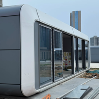 Bâtiment préfabriqué en acier entièrement équipé, type capsule Apple, utilisé comme entrepôt de stockage temporaire