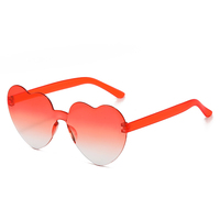 Vente en gros Love Sun Lunettes d'une seule pièce en forme de coeur pêche colorées bon marché Verre à lentille PC sans monture antireflet