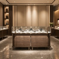 Vitrine de présentation de bijoux incurvée de luxe avec éclairage LED, en bois et verre, avec tiroirs, sur mesure pour boutique