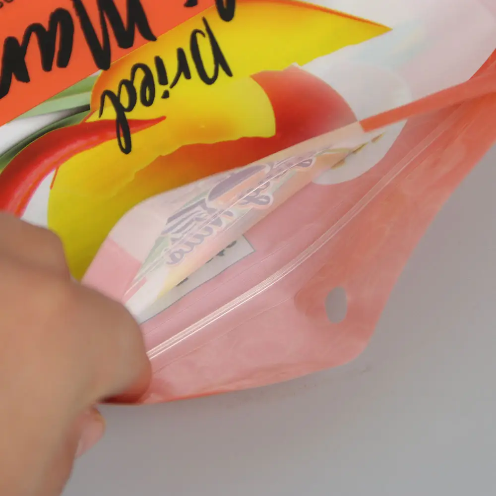 Individuelles Logo Plastik-Nuss-Verpackungsbeutel Verpackung Lebensmittellagerungsbeutel Trockenfutter Trockenfrüchte Mangotaschen