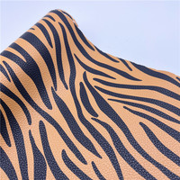 Tissu PU en cuir synthétique à motif zèbre pour la décoration de sacs et de meubles