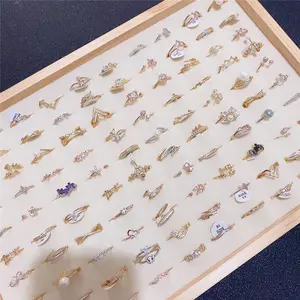 2023 Multi Factory Günstige Ring Kupfer beschichtet Real Gold Mikro-eingelegte Zirkon Ring Mode Mixed Batch Fingerring Frauen Großhandel