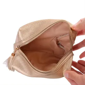 ファッションレディースエレガントメタルジッパータッセル防塵ハンドバッグリッチグレインPuレザー収納女性化粧品バッグ