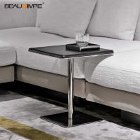 Table d'appoint en travertin minimaliste avec dessus en verre artisanal & base en pierre naturelle, personnalisable pour salon