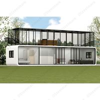 Cabine de pomme au deuxième étage avec terrasse maison conteneur avec escalier
