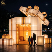Weihnachtsmann-Foto-Spot-Rahmen mit Beleuchtung für Themenparks und Einkaufszentren bei Feiertagsevents