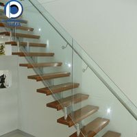 Escalier en colimaçon en bois massif sur mesure PRIMA, design flottant moderne pour villa intérieure