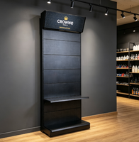 Présentoir en panneau perforé noir, forte capacité de charge, idéal pour la promotion en magasin et la présentation des produits.