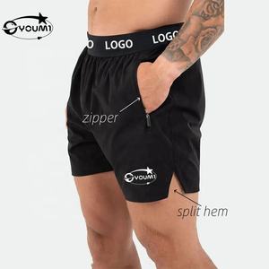 Shorts de sport <span class=keywords><strong>pour</strong></span> hommes YOUMI avec logo personnalisé, taille mi-haute, coupe sportive, ourlet fendu, durables, <span class=keywords><strong>pour</strong></span> l'entraînement, la salle de sport, athlétiques, séchage rapide - Product Image 1