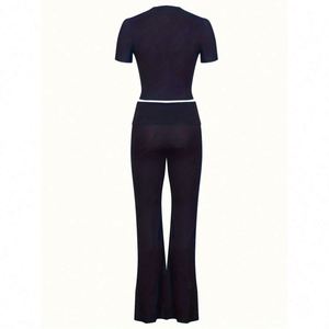 Ensemble de survêtement sport et décontracté à col rond et manches courtes avec pantalon assorti - Product Image 2