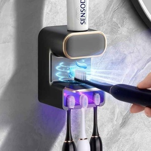 Dispensador automático de pasta de dientes para pared de baño con logotipo personalizado, con 3 ranuras desinfectantes para cepillos de dientes, dispensador automático de pasta de dientes con sensor. - Product Image 1
