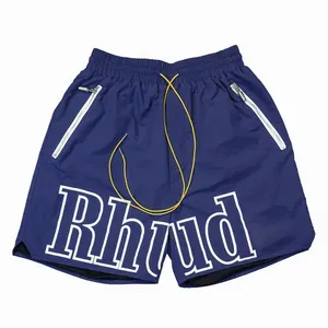 โลโก้ที่กําหนดเองการพิมพ์ตัวอักษรระบายอากาศกลางแจ้งเอวยางยืดฤดูร้อน 100% ไนลอนลําลองกางเกงว่ายน้ํา Rhude กางเกงขาสั้นตาข่ายซับ