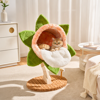 Maison pour chat d'intérieur minimaliste avec bord rose et tapis en peluche blanc pour les magasins de détail