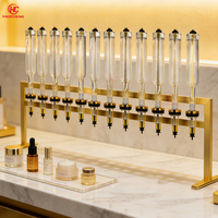 Distributeur de parfum de luxe doré, machine à parfum multi-flacons, station de service de parfums