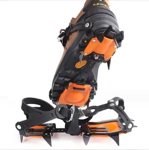 Edición profesional 10 dientes Crampones de hielo/Botas de nieve de invierno Cubiertas para zapatos Pinza