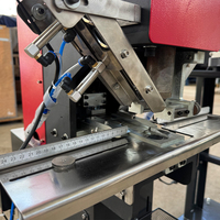 Machine automatique de poinçonnage et de pressage des œillets de rideaux