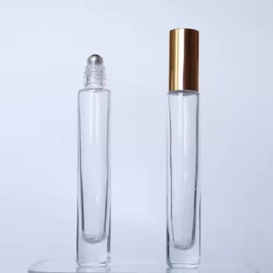 Botella de Vidrio Transparente Redonda de Lujo de 1/3 oz (10 ml) con Base Pesada y Tapa Atomizadora Dorada, Plateada o Negra para Aceite de Perfume - Product Image 6