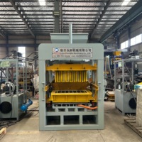 Machine à former des blocs de béton QT4-15 avec une puissance hydraulique fiable pour la production de briques de maçonnerie et de pavés