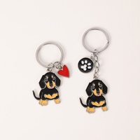 Nouveau pendentif pour animaux de compagnie en alliage, breloque Teckel, accessoire de mode transfrontalier avec détails cœur et empreinte de patte