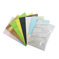 Üç tarafı mühür açılıp kapanabilir koku geçirmez metalik Mylar kilitli siyah holografik alüminyum folyo Zip kilit plastik torba