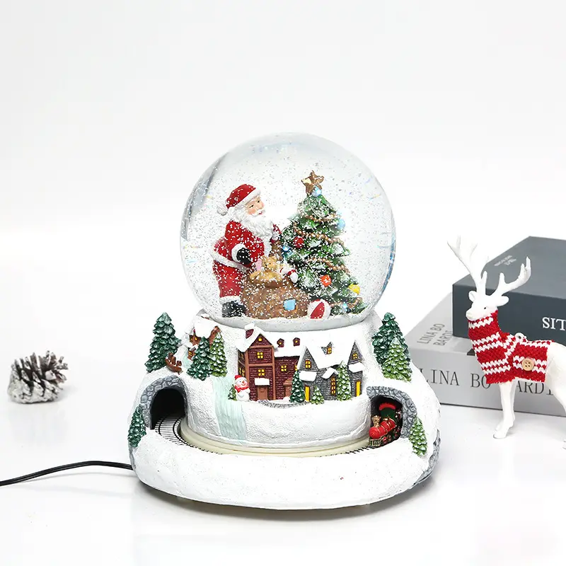 Custom resin glass christmas lantern snow globe with blowing snow automatic rotation of train with light and music