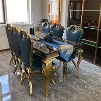 Luxuriöses Nordisches Marmor-Esstisch- und Stuhl-Set mit Edelstahl-Goldbeschichtung für Zuhause & Restaurant